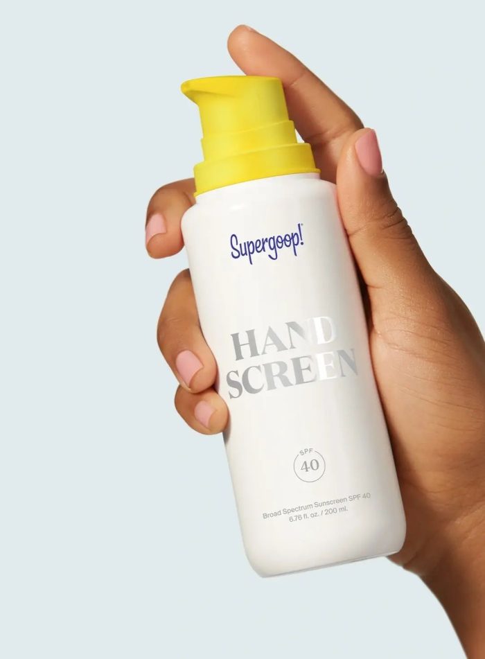 supergoop-handscreen-spf-40-model-with-pack-yellow-applicator